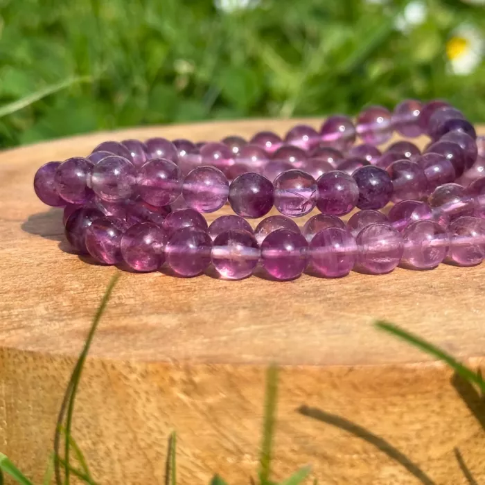 Bracelet fluorite violette sur un cercle de bois