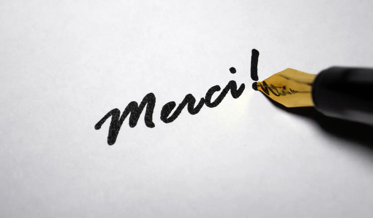 Merci écrit au stylo plume